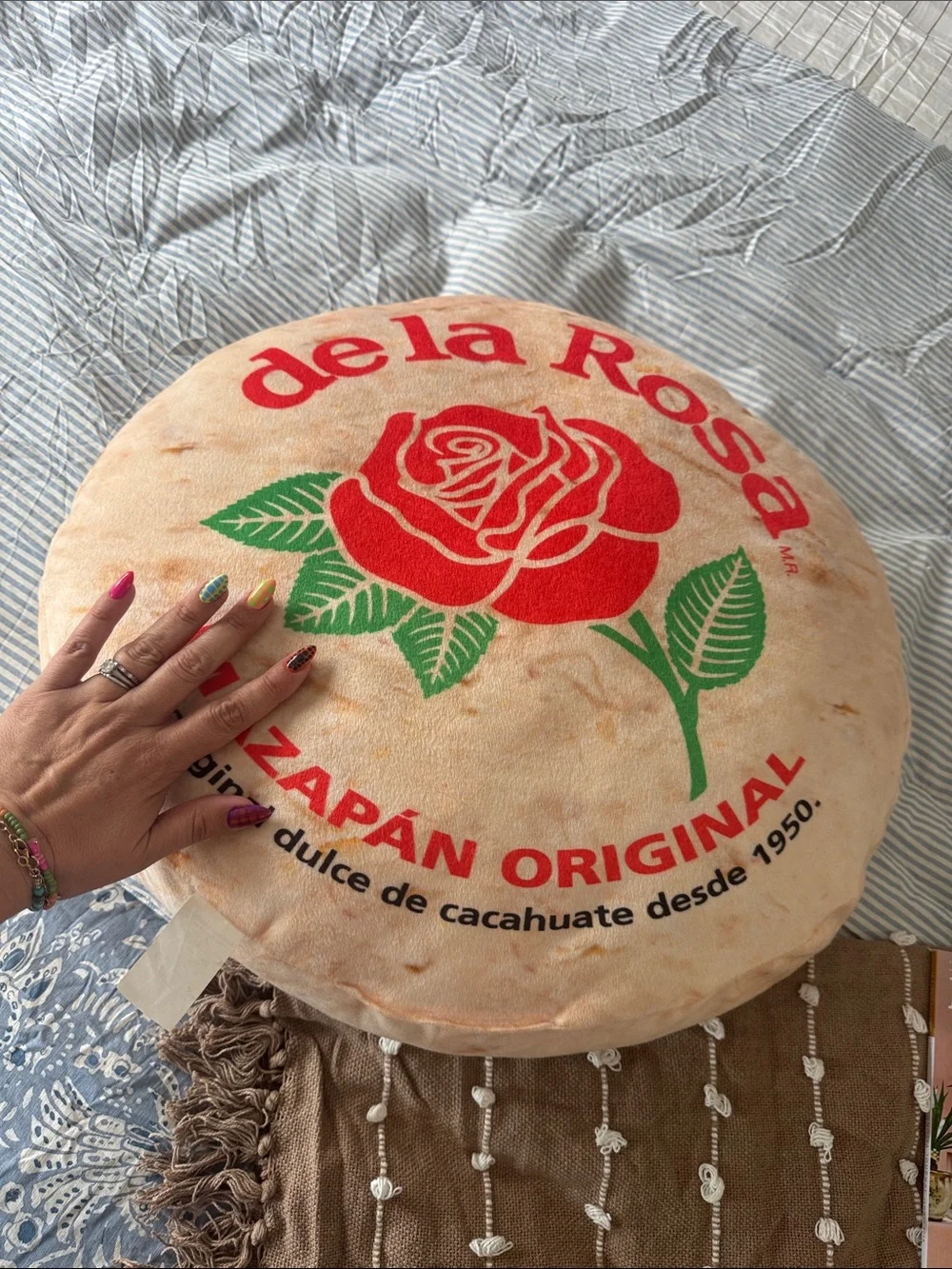 de la Rosa Round Logo Pillow - Red Rose Print